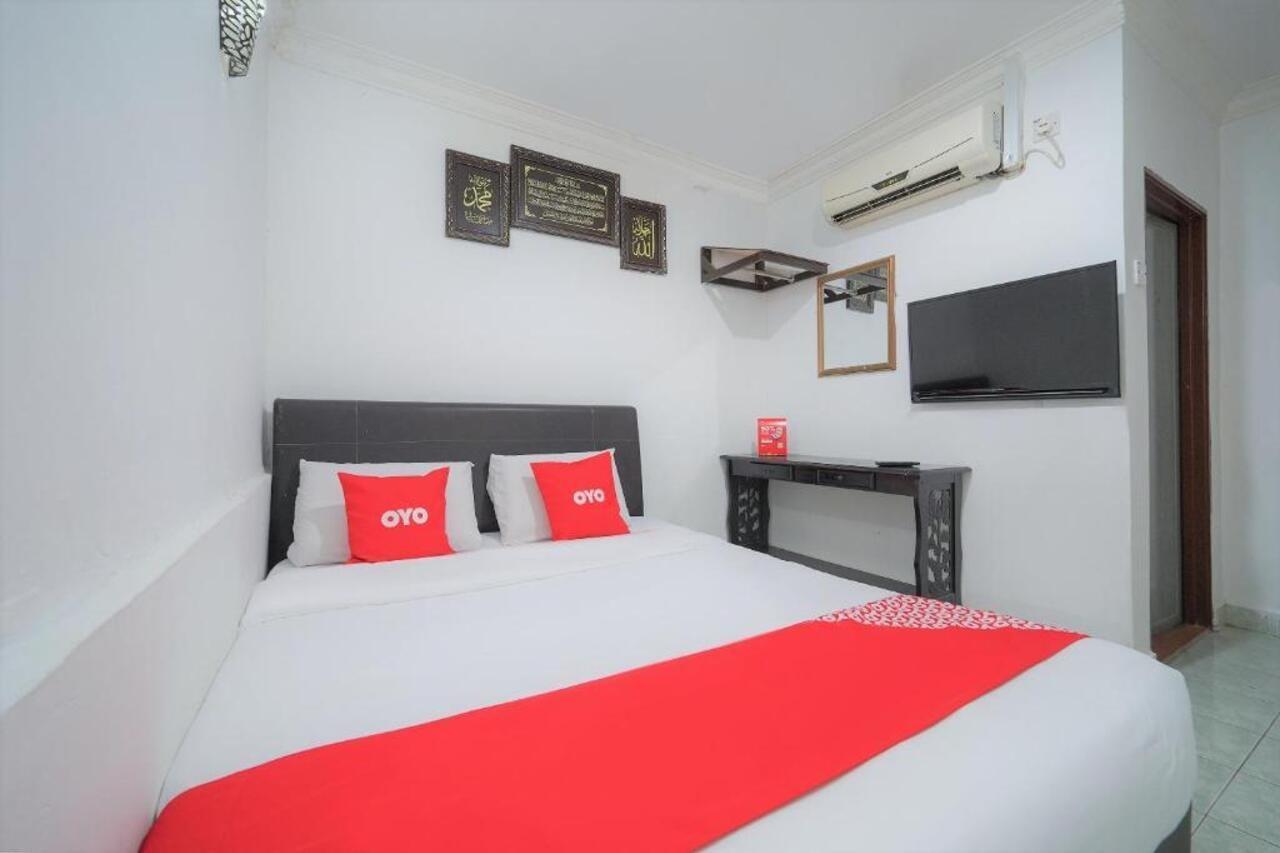 Oyo 89850 Mutiara Motel Kuah Ngoại thất bức ảnh